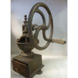 A late 19thC cast iron counter-top coffee bean grinder,