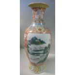 An early 20thC Chinese porcelain vase of waisted baluster form with a narrow neck and a flared rim,