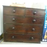 A late Victorian mahogany dressing chest, the two short/three long drawers with bun handles 37.