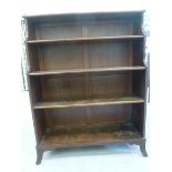 A mid 19thC mahogany open front, waterfall bookcase with a lacquered brass galleried top,