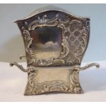 An Edwardian silver tea caddy, having a hinged lid, fashioned as a sedan chair,