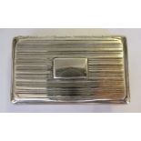 A George IV silver snuff box with finely reeded ornament, a flush fitting,