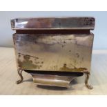 A silver cigarette box of square form with straight sides and a hinged lid,