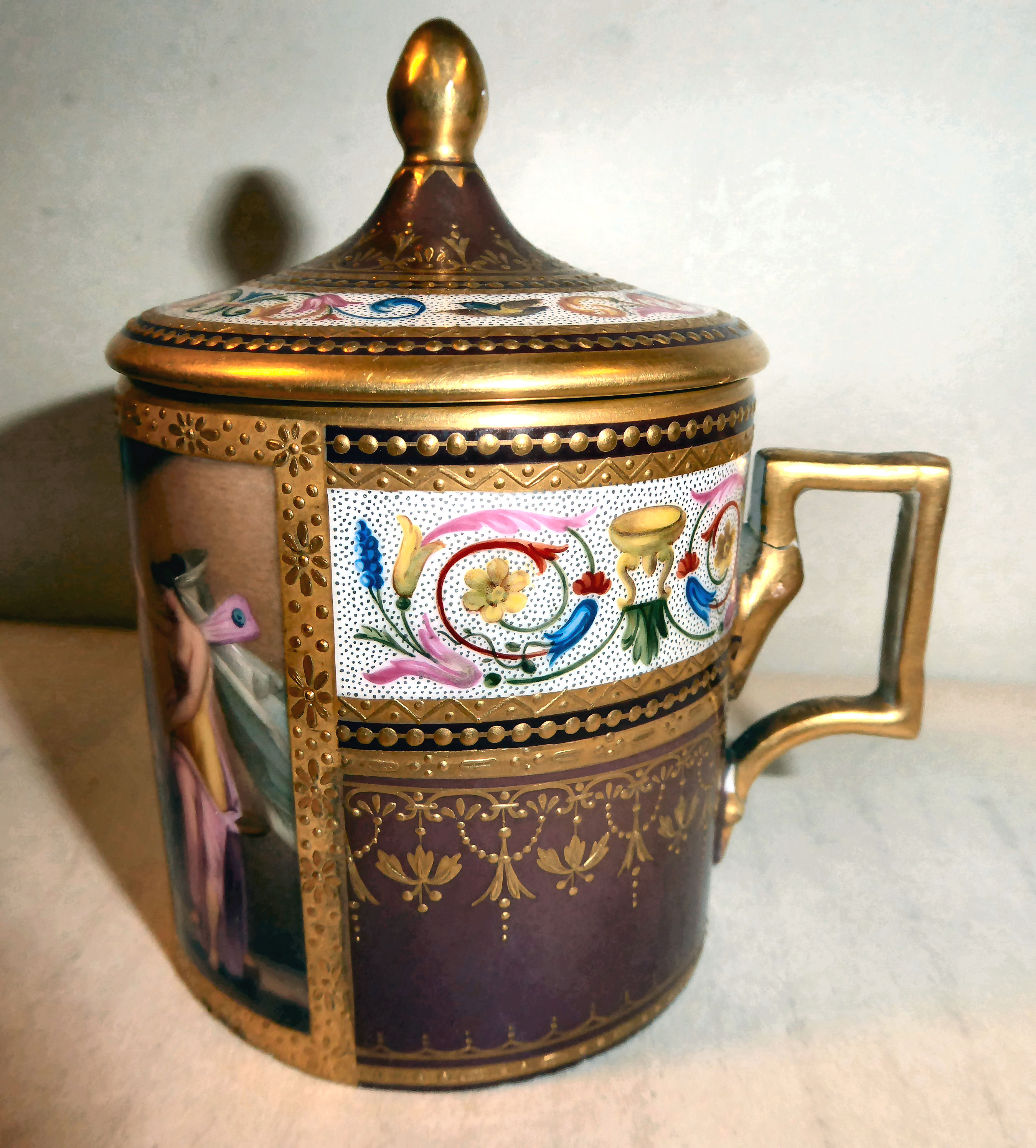 An early 20thC Austrian porcelain cylindrical cup and cover,