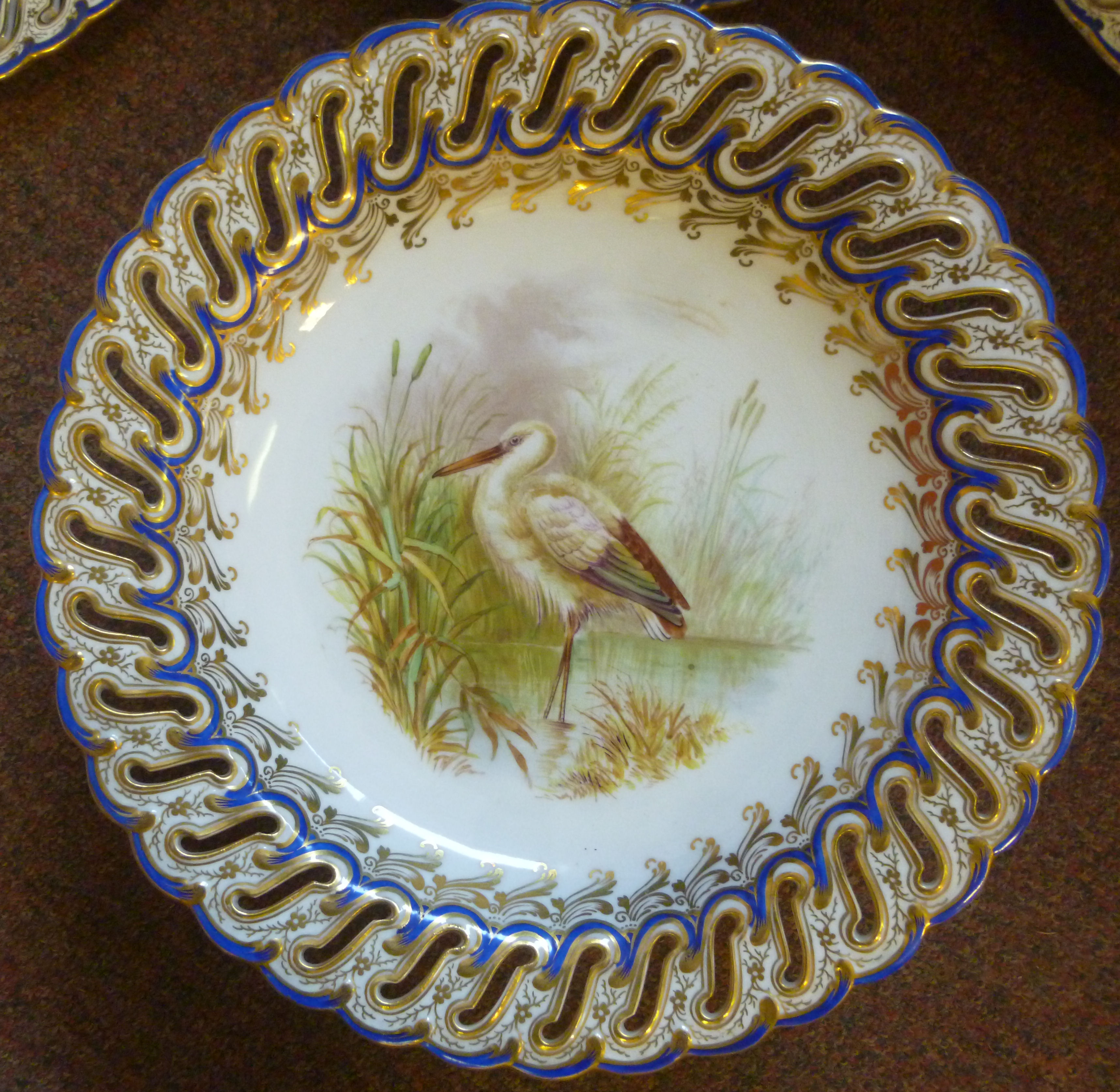 A set of six late 19thC china dessert plates and a matching comport with uniformly pierced and - Image 8 of 12