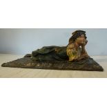 A painted cold cast bronze figure,