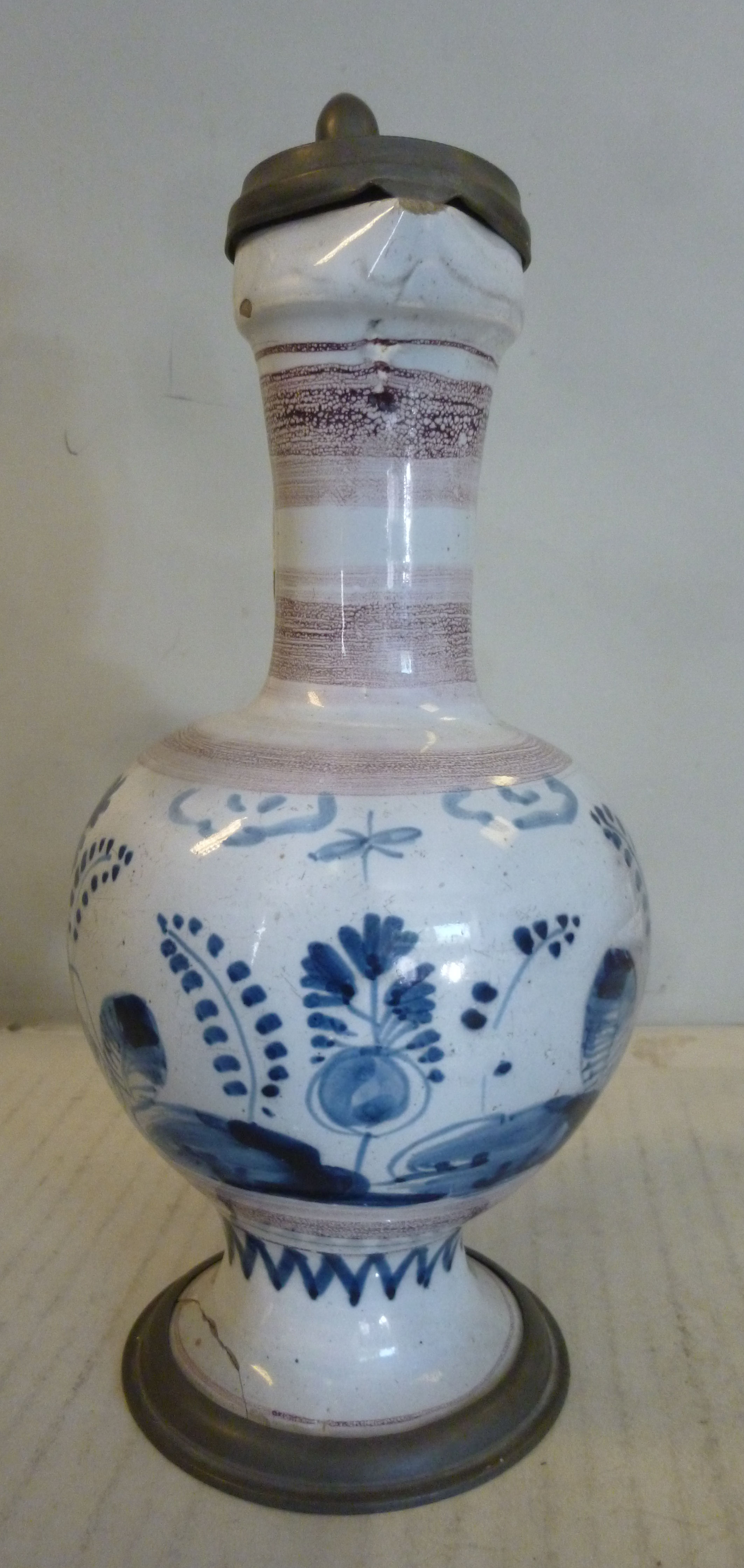 An 18thC German/North European Delftware ewer of bulbous form with a long narrow neck, loop handle, - Image 2 of 11