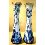 A pair of early 20thC Moorcroft Macintyre pottery specimen vases of baluster form with flared,