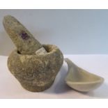 A Chinese carved stone mortar 3''dia and attendant pestle;