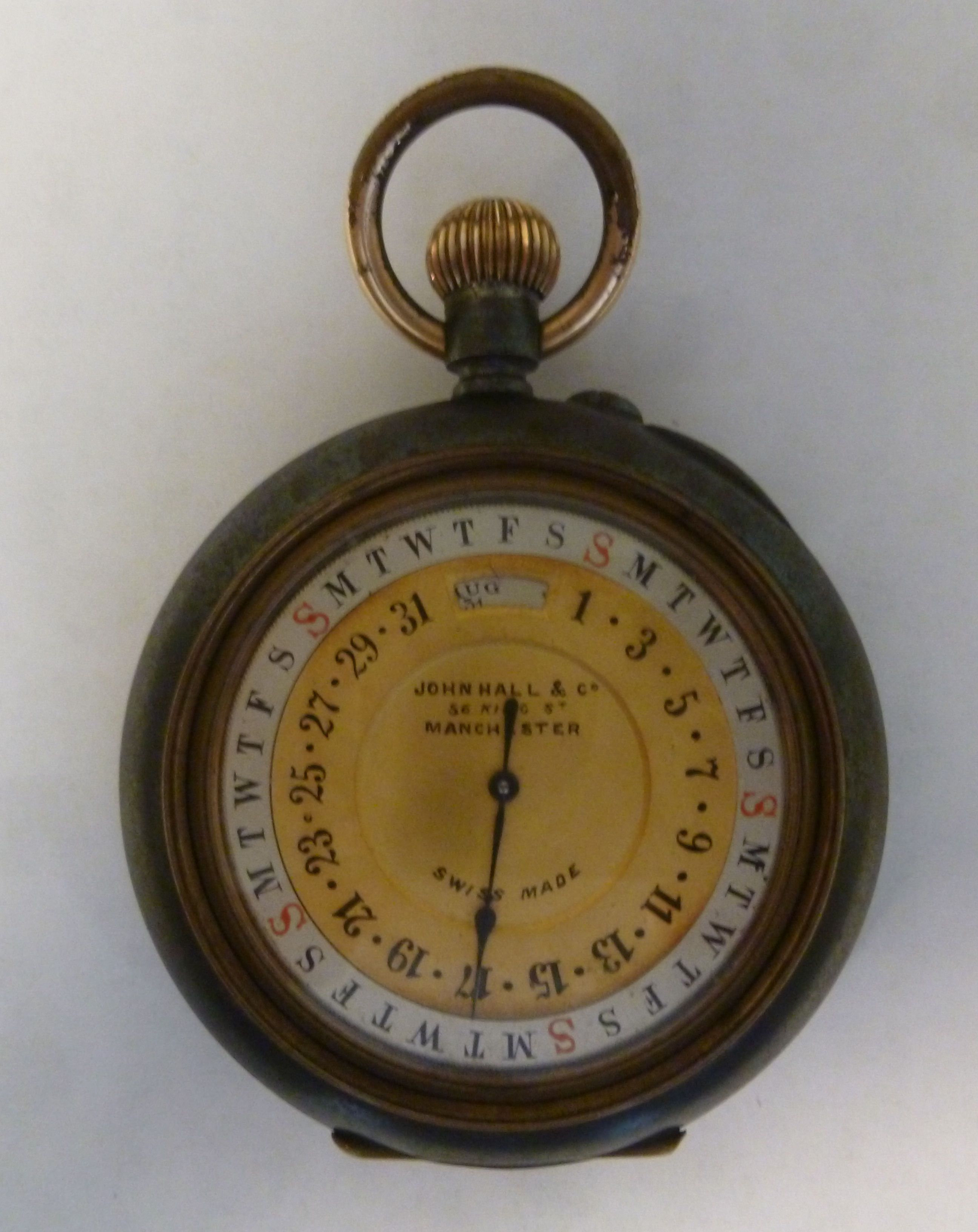 A late 19th/early 20thC lacquered steel and brass cased pocket watch,