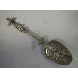 A late 19thC Dutch silver coloured metal presentation spoon,