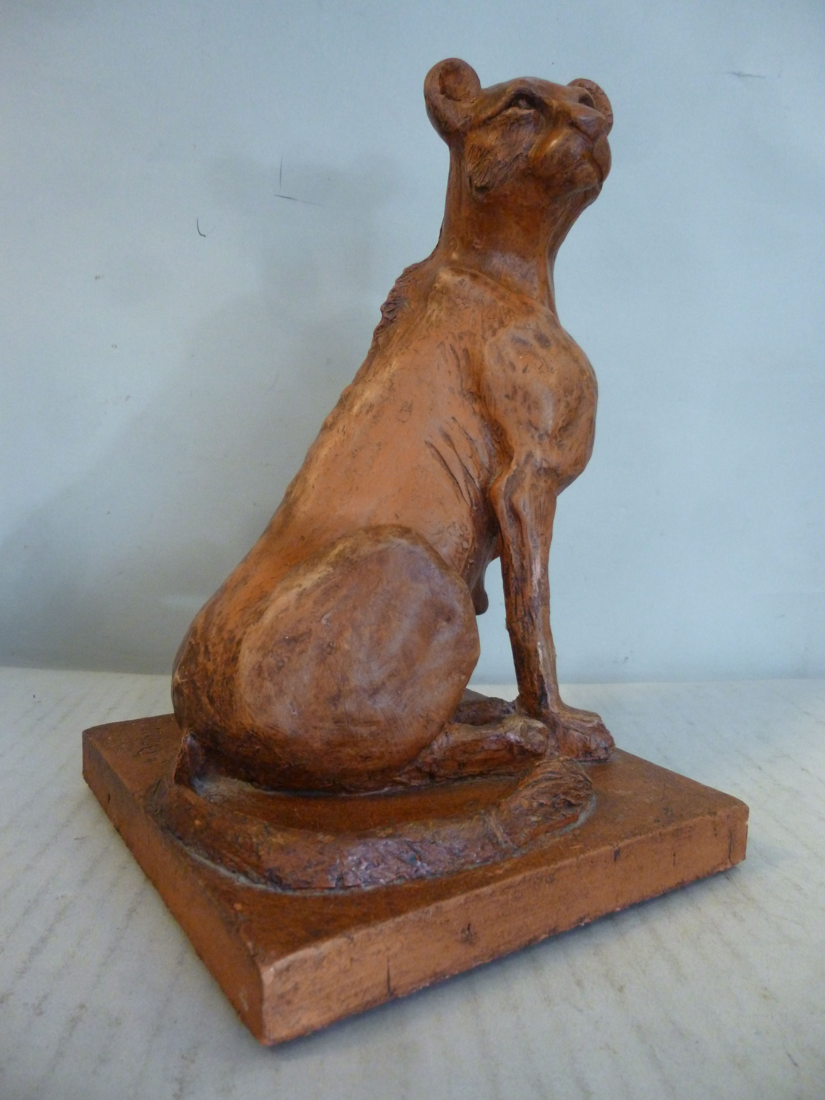 Ajacques - a terracotta model, a stylised seated lioness, - Image 2 of 4