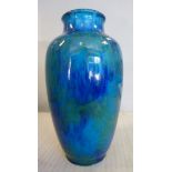 An early 20thC MP Series streaky blue and green glazed porcelain vase of baluster form bears a