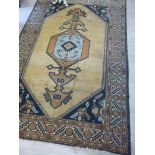 An early 20thC Turkish rug,