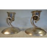 A pair of Mexican Sterling silver designer candleholders,