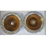 A pair of mid 19thC silver plated wine coasters,
