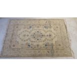 A Kashan rug with a central medallion,
