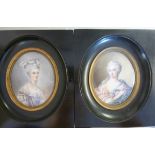 A pair of oval portrait miniatures, late 18thC fashionable young women,