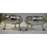 A pair of late Victorian silver bead bordered bulbous, circular salt cellars,