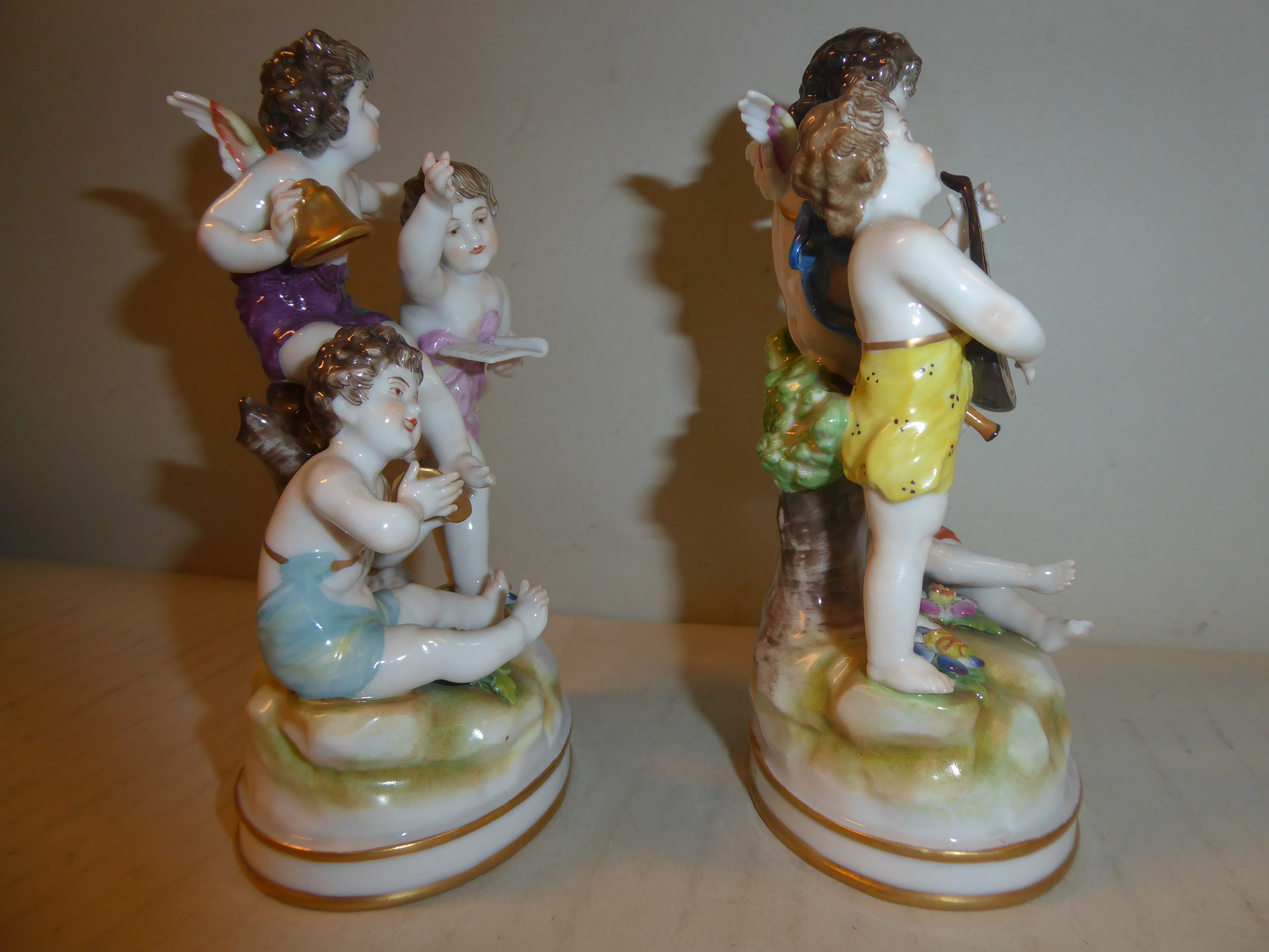 A pair of early 20thC Naples porcelain groups, cherubs playing musical instruments 5. - Image 5 of 6