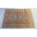 A Caucasian rug with four star shaped medallions,