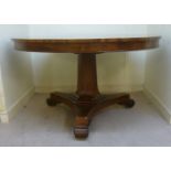 An early Victorian rosewood breakfast table, the figured tip-top with a straight cockbeaded apron,