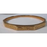 A 9ct gold foliate scroll engraved,