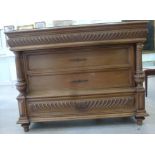 A late 19th/early 20thC French wrythen reed carved and panelled light oak chest,