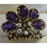 A 14ct gold amethyst and diamond set floral ring