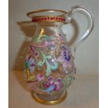 In the manner of Lobmeyer, a 19thC glass ewer of ovoid form, having a drawn loop handle,