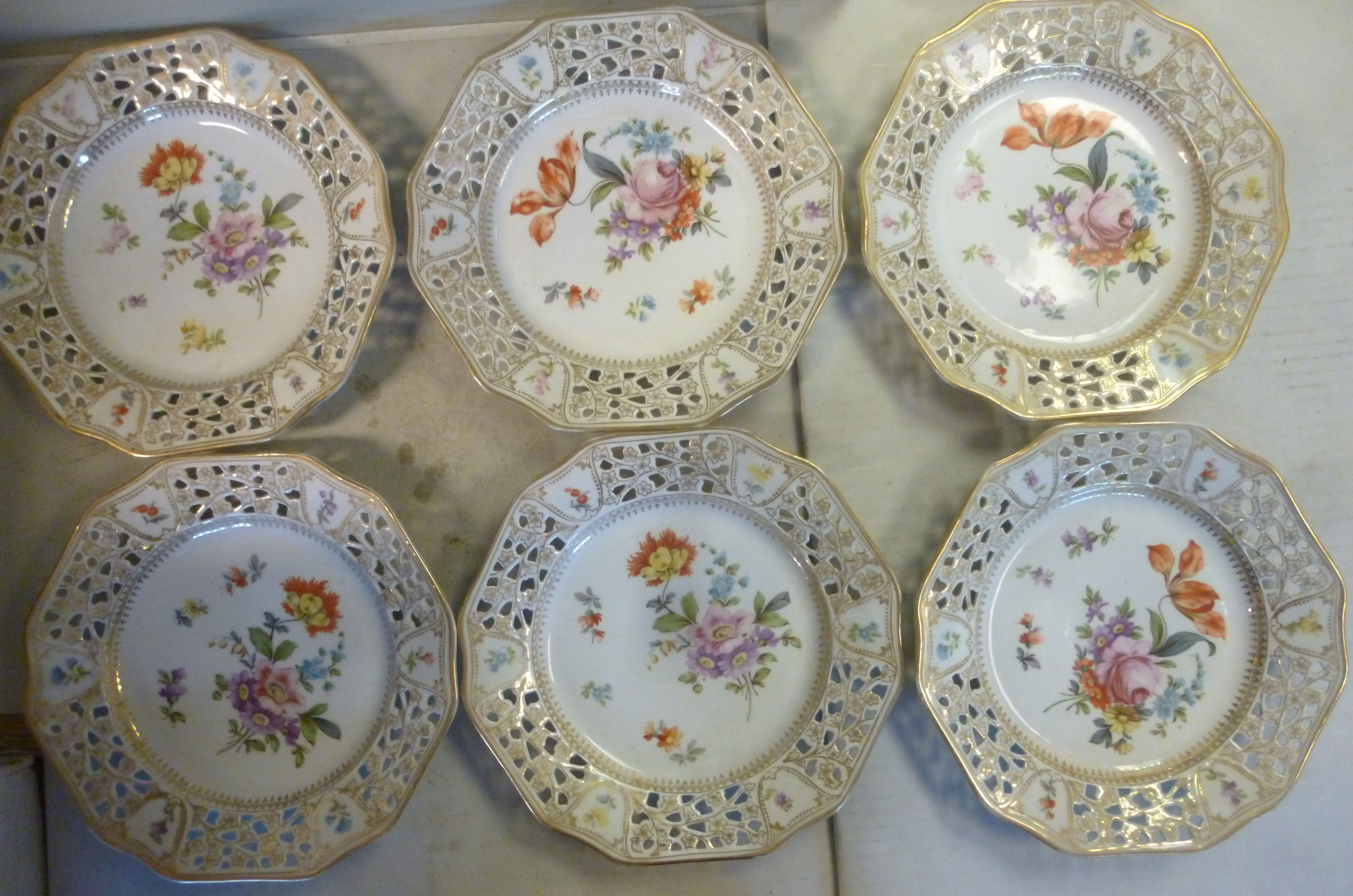 A set of six early 20thC Continental porcelain hexagonal plates,