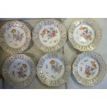 A set of six early 20thC Continental porcelain hexagonal plates,