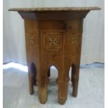 An early 20thC North African amboyna and hardwood octagonal occasional table,