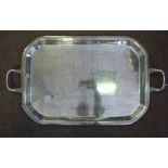 An Indian silver coloured metal rectangular serving tray with round corners, a plain,