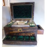 A late Victorian gilt metal bordered coromandel veneered vanity box with straight sides,