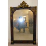 A mid Victorian mahogany framed pier glass, the arched, bevelled plate set in a wide,