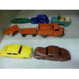 Eight Dinky diecast model commercial and domestic vehicles: to include a 'Bedford Tipper Truck'
