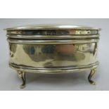 A silver oval ring box,
