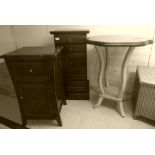Three pieces of modern small furniture: to include a mahogany finished, eight drawer bedside chest,