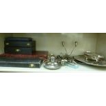 Silver plated tableware: to include an oval serving tray with foliate ornament 15''dia OS4
