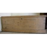 A late 19th/early 20thC rustically constructed pine box with a hinged lid and straight sides,