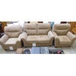 A G-Plan three piece suite comprising a two seater settee and two armchairs,