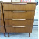 A 1970s teak finished four drawer dressing chest, raised on square,