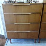 A 1970s teak finished four drawer dressing chest, raised on square,