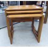 A nesting set of three G-Plan teak occasional tables,