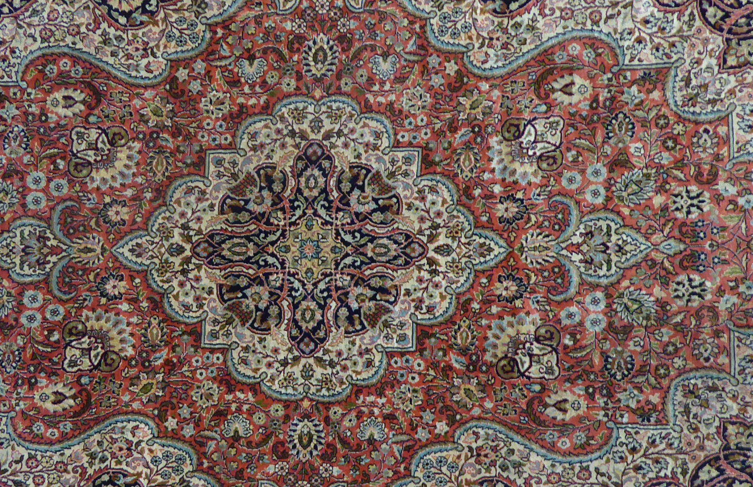 A modern silk rug with a central serpentine outlined medallion, bordered by flora and foliage, - Image 2 of 7