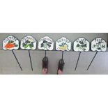 A set of six cast iron vegetable patch markers SR