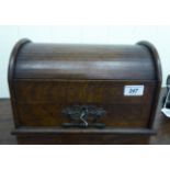 An Edwardian oak desk-top stationary box with a domed tambour top and a drawer with a part fitted