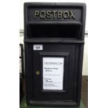A modern black painted cast iron post box 17''h 10''w CA