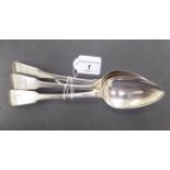 A matched set of three 19thC silver fiddle pattern table spoons mixed London marks CS